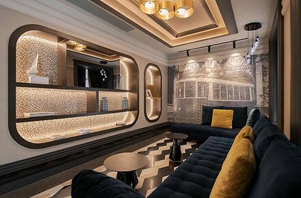 Interiorismo del hotel Eurostars Lisboa Baixa por PF1 Interiorismo Contract, con mural del tranvía lisboeta y estética inspirada en el fado