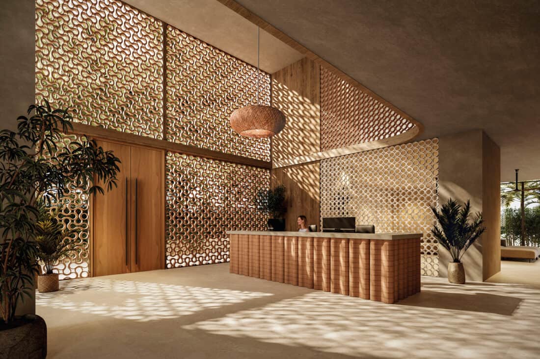 Recepción de hotel con celosías y mostrador en sistema cerámico O-Buit de Gresmanc Group, con juego de luces y sombras sobre suelo neutro 